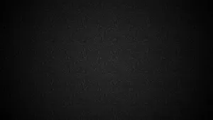 Black Wallpaper With A Swirl Pattern Wallpaper