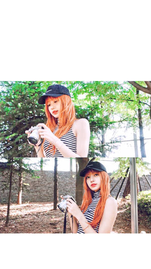 Blackpink Lisa With A Camera Wallpaper