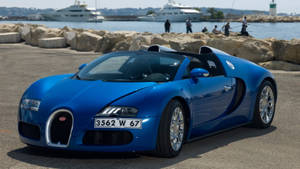 Blue Bugatti On Beach Iphone Wallpaper