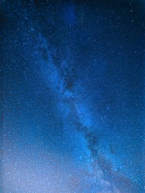 Blue Galaxy Peppered With Stars Wallpaper