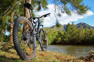 Blue Mountain Bike Near Lake Wallpaper