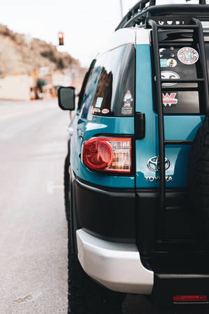 Blue Toyota Suv Rear View Wallpaper