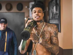 Blueface Aiming Weapon Wallpaper