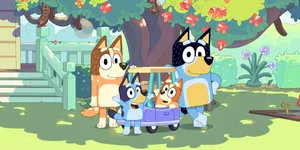 Bluey Family In Front Of House Wallpaper
