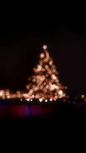 Blurry Christmas Tree Holiday Iphone Wallpaper