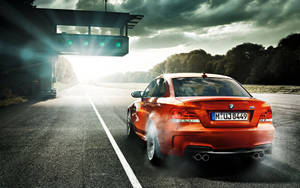 Bmw M Series Car On Road Wallpaper