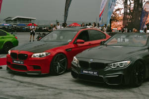 Bmw M5 And F33 Racing Track Wallpaper