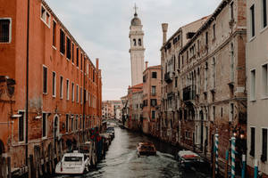 Boat In Venice Canal Wallpaper