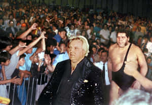 Bobby Heenanand Wrestler Walkingto Ring Wallpaper