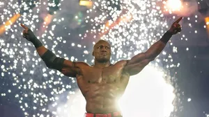 Bobby Lashley Posing With Fireworks As Background Wallpaper