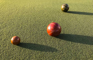 Bocce Ball On Grass Wallpaper