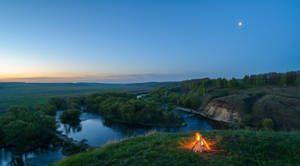 Bonfire In Hill View Wallpaper