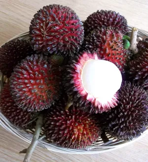 Bowl Of Ripe Pulasan Fruits Wallpaper