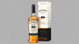 Bowmore 12 Years Old Scotch Whisky Bottle And Glass Wallpaper