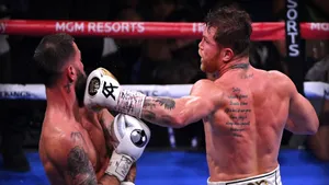 Boxer Showcasing A Bold Neck Tattoo Wallpaper