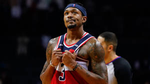 Bradley Beal Clutching His Jersey Wallpaper