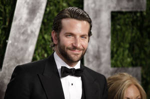 Bradley Cooper Sleek Black Suit Wallpaper