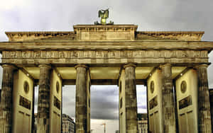 Brandenburg Gate Dark Cloudy Sky Wallpaper