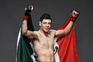 Brandon Moreno Holding Mexican Flag Wallpaper