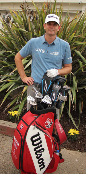 Brendan Steele With Golf Bag Wallpaper