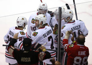 Brent Seabrook Smiling With Teammates Wallpaper