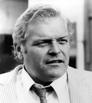 Brian Dennehy Black And White In White Suit Wallpaper