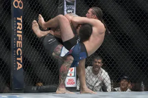 Brian Ortega Grappling Neck Opponent Wallpaper