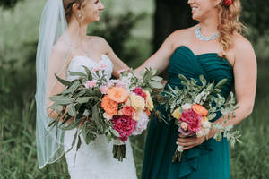 Bride And Bridesmaid With Flowers Wallpaper