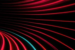 Bright Light Red Across A Reflective Surface Wallpaper