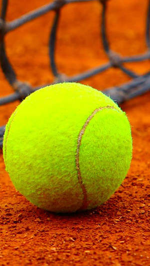 Bright Neon Tennis Ball Closeup Phone Wallpaper