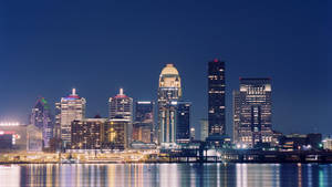 Bright Skyline Louisville At Night Wallpaper