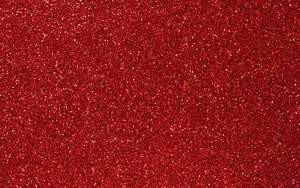 Brighten Up Your Life With A Touch Of Red Glitter Wallpaper