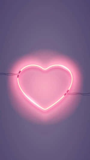 Brighten Up Your Life With An Electrifying Neon Heart! Wallpaper