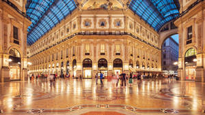 Brightened Gallery In Milan At Night Wallpaper