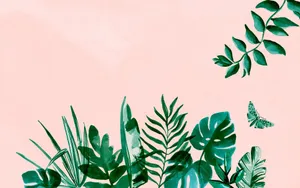 Brightly Colored Tropical Leaves On A Desktop Wallpaper