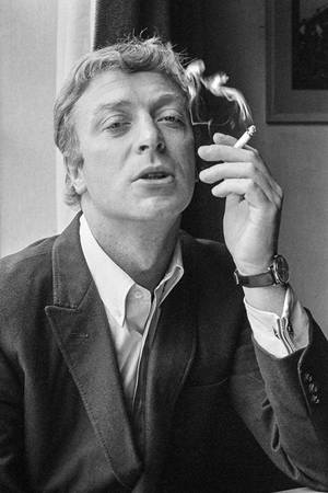 British Actor Michael Caine 1965 Photograph Wallpaper