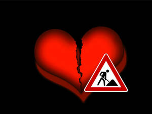 Broken Heart With Maintenance Signage Wallpaper