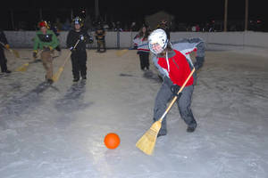 Broomball Players At Night Wallpaper