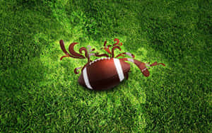 Brown Football On Football Field Wallpaper