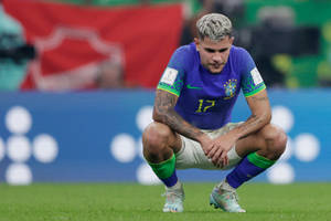 Bruno Guimarães Crouched On Fiel Wallpaper