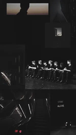 Bts Black Members Sitting Aesthetic Wallpaper