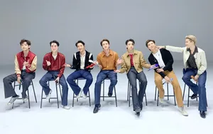 Bts Desktop On Row Of Stool Chairs Wallpaper