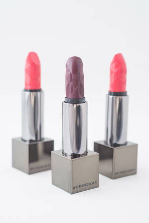 Burberry Peach And Plum Lipsticks Wallpaper