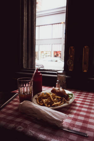 Burger And Fries Checkered Table Wallpaper