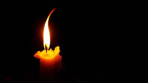 Burning Candle Wallpaper