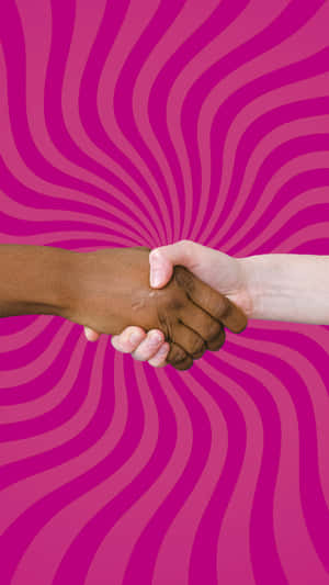 Business Handshake On A Pink Background Wallpaper