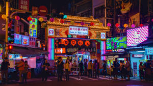 Bustling Raohe Night Market In Taipei Wallpaper