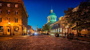 Bustling Street In The Heart Of Montreal, Canada Wallpaper