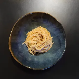 Cacio E Pepe On A Blue Plate Wallpaper
