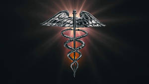 Caduceus Medical Symbol Golden Lens Wallpaper